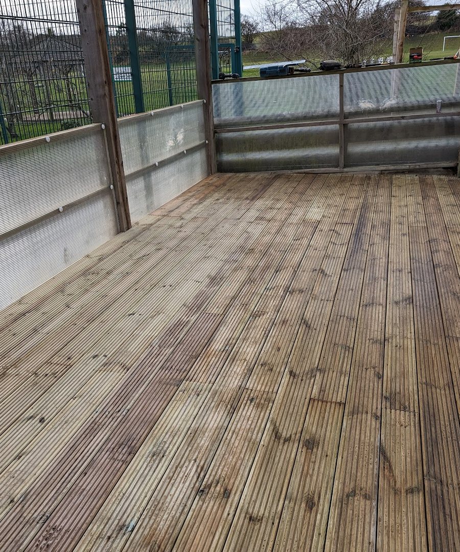 The covered timber deck Reggie built over a flooded school sandpit